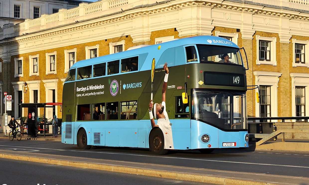 A blue double decker 149 bus on London bridge