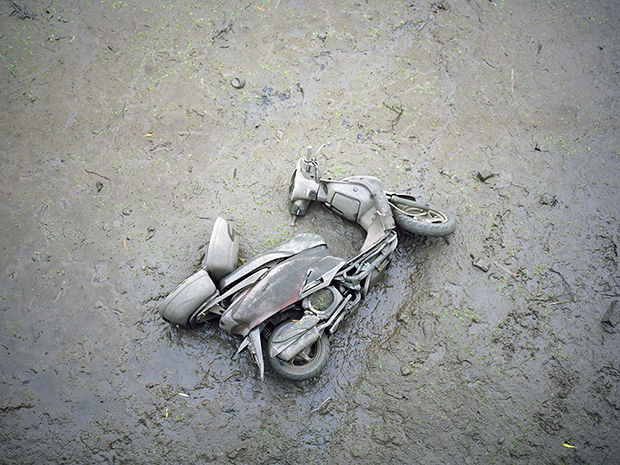 Scooter in the mud