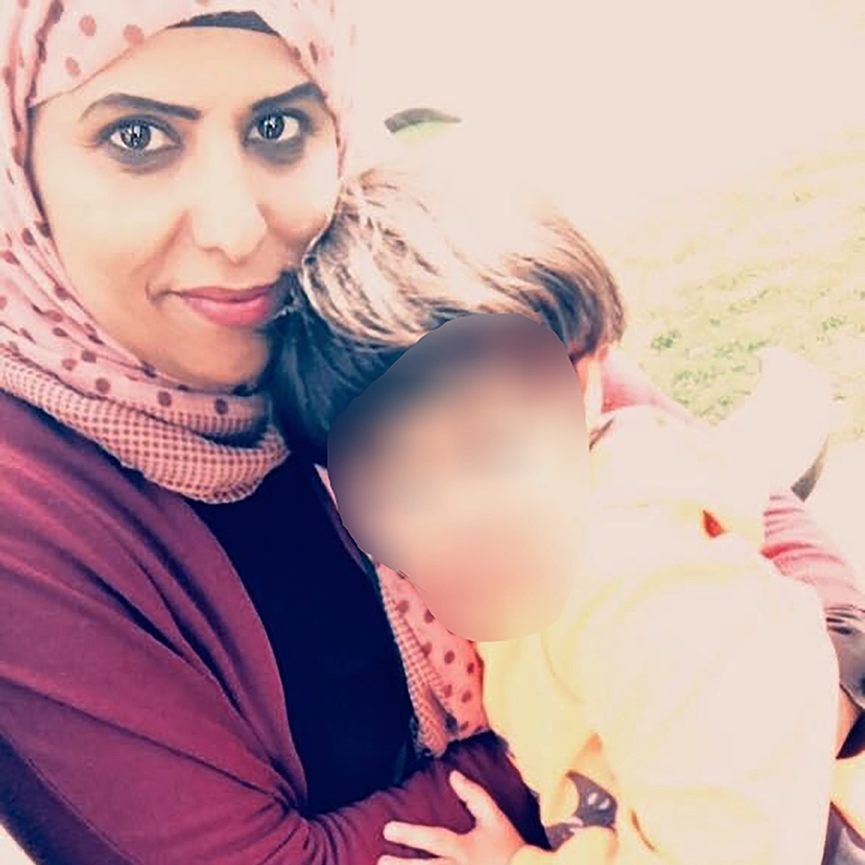 Amnah Al-Shammari with her son