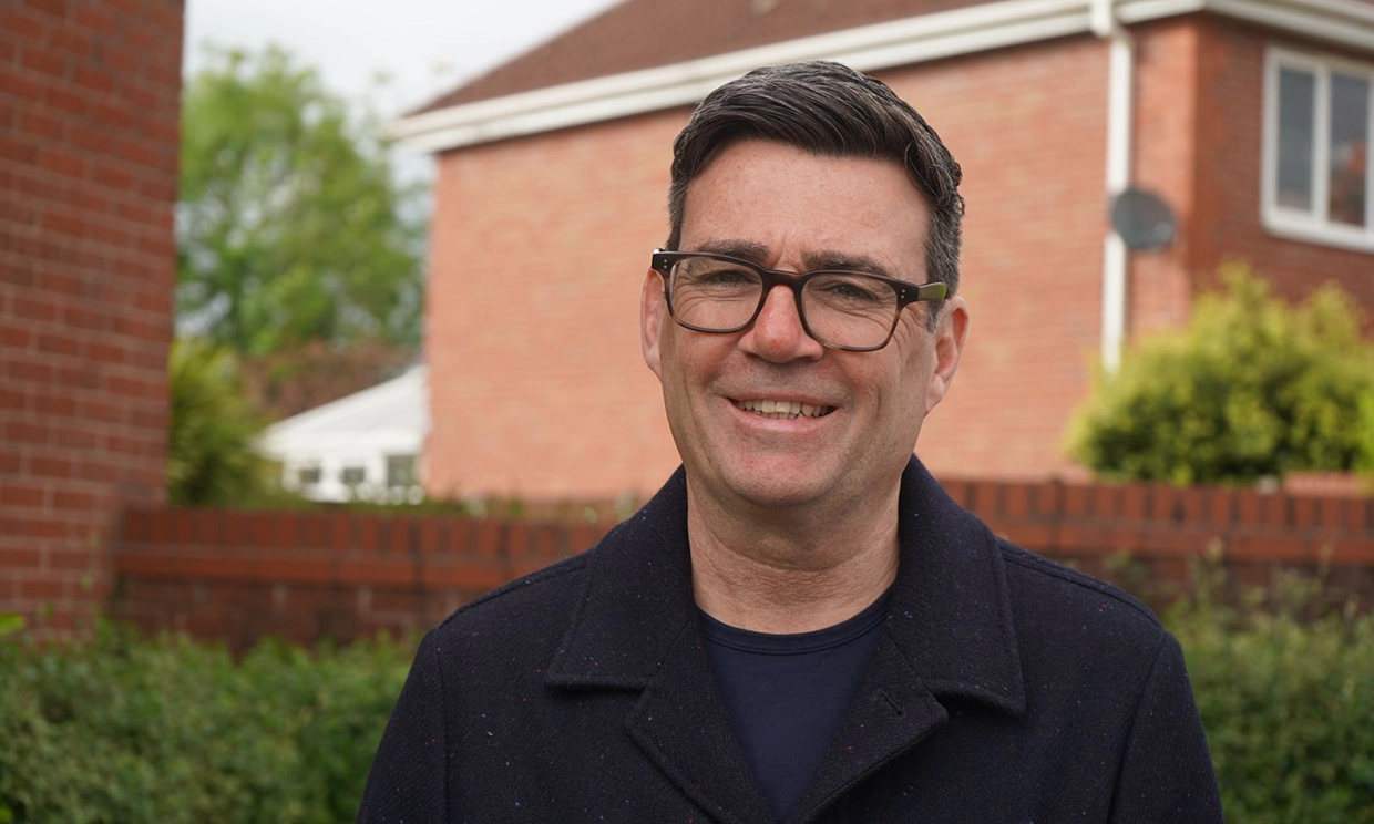 Andy Burnham smiling to camera
