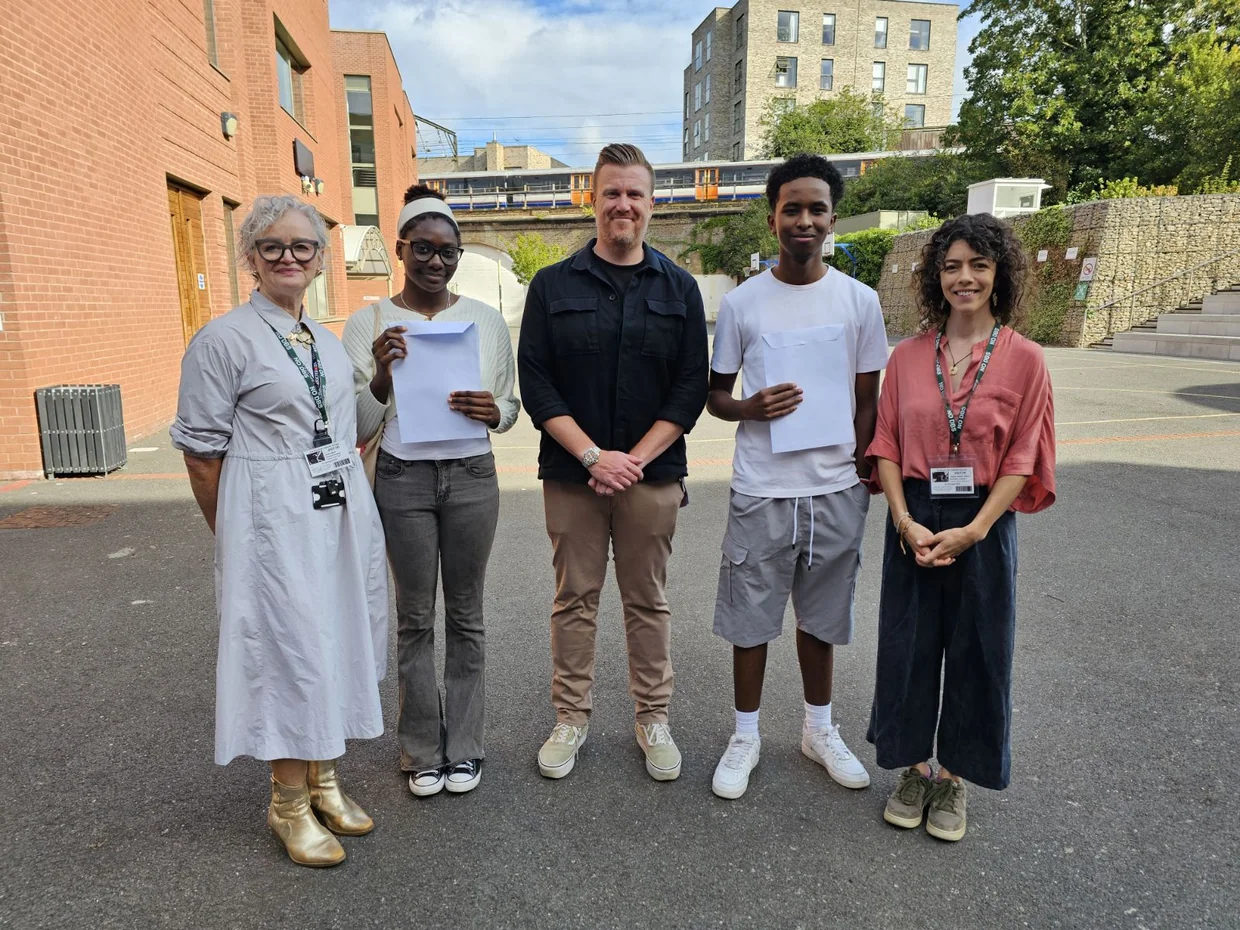 Photograph of Jacquie Burke, group director for children and education (far left), Cllr Laura-Louise Fairley, deputy cabinet member for SEND support (far right), Adam Hall, Executive Headteacher Cardinal Pole Catholic School (centre) celebrate results with Year 11 students