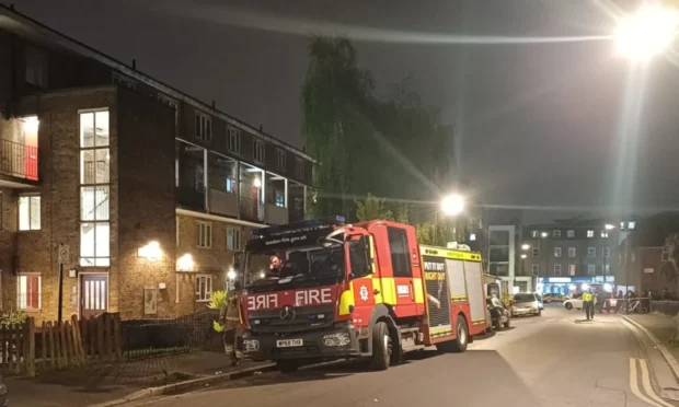 A fire engine outside a block of flats