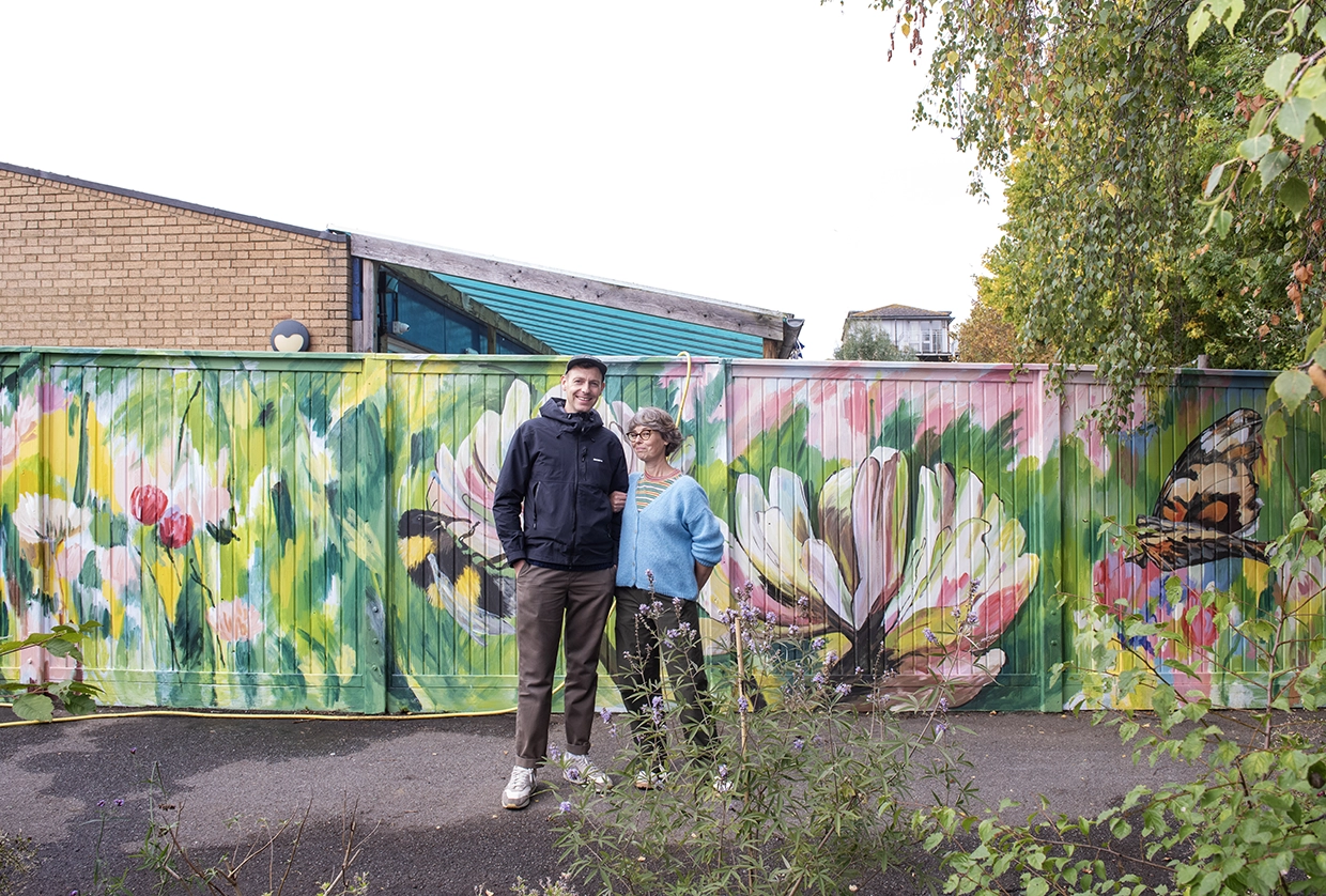 Ward-Thornton and Cochrane pictured in front of the mural