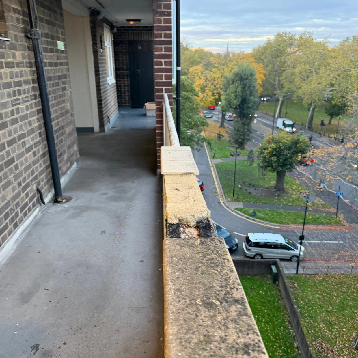 The communal balcony of the block where Amnah and her family live