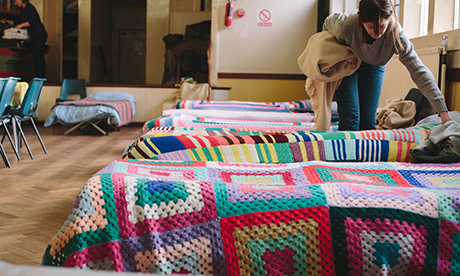 Helping hand: Volunteers make the beds. Photograph: Paul Driver