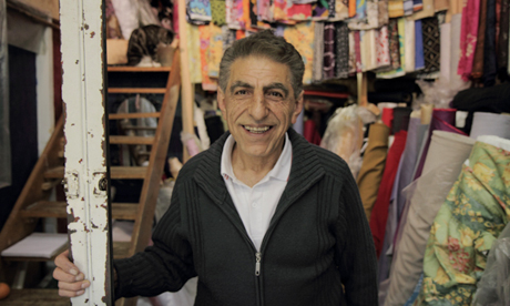 Hamid sells fabrics at Ridley Road Market. Photo: Nick Aldridge