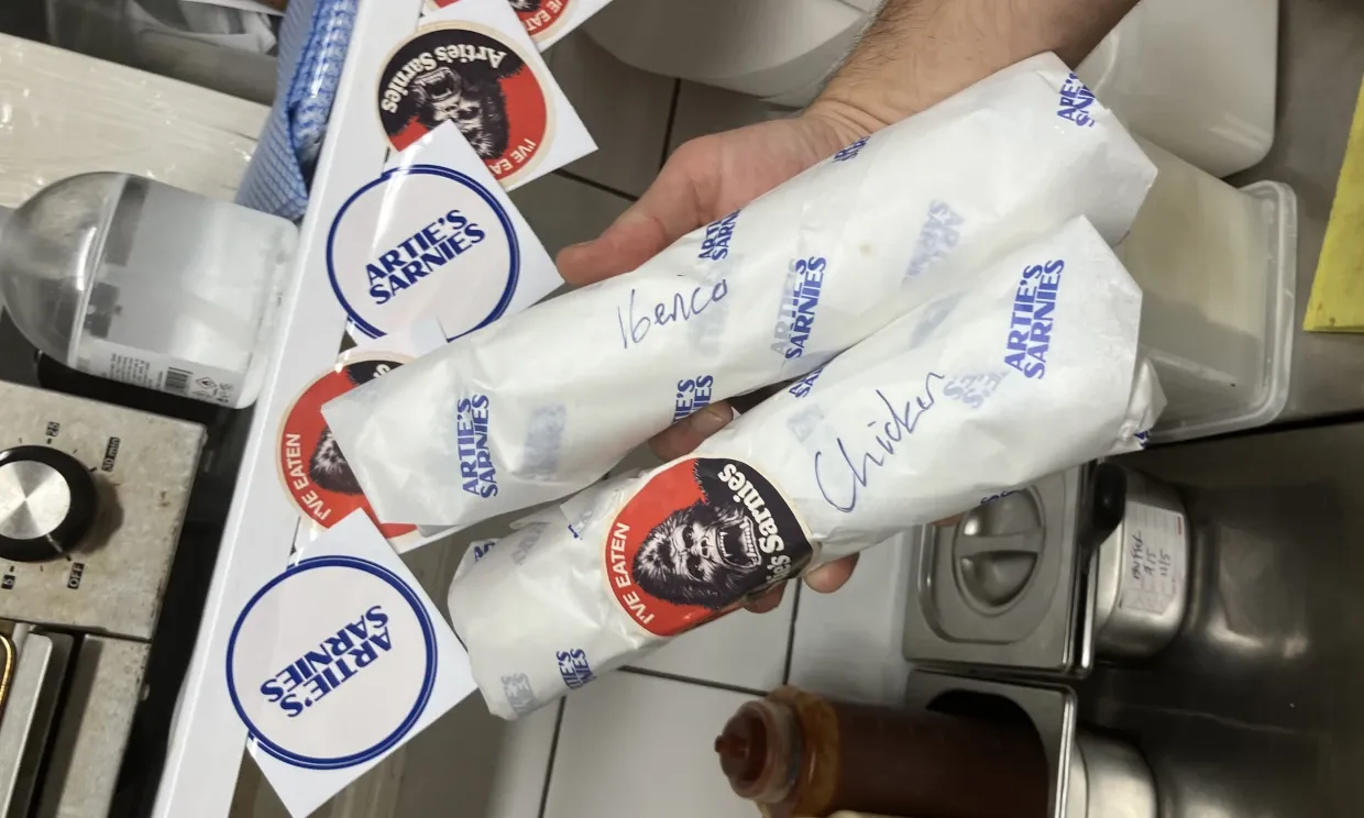 Two wrapped sandwiches, one says "Iberico" one says "Chicken"