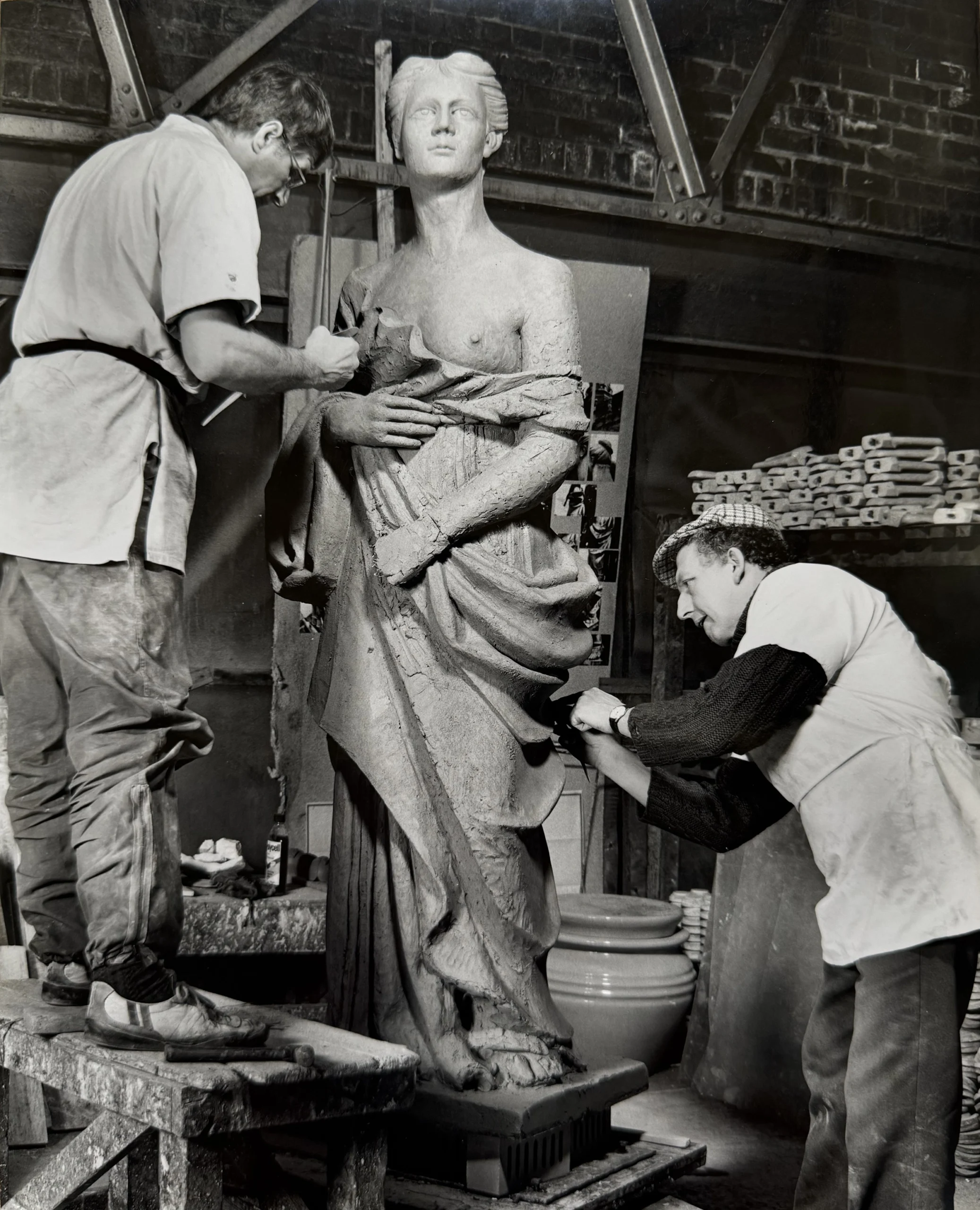 Michael Mason (left) with Hackney Empire sculpture 1989