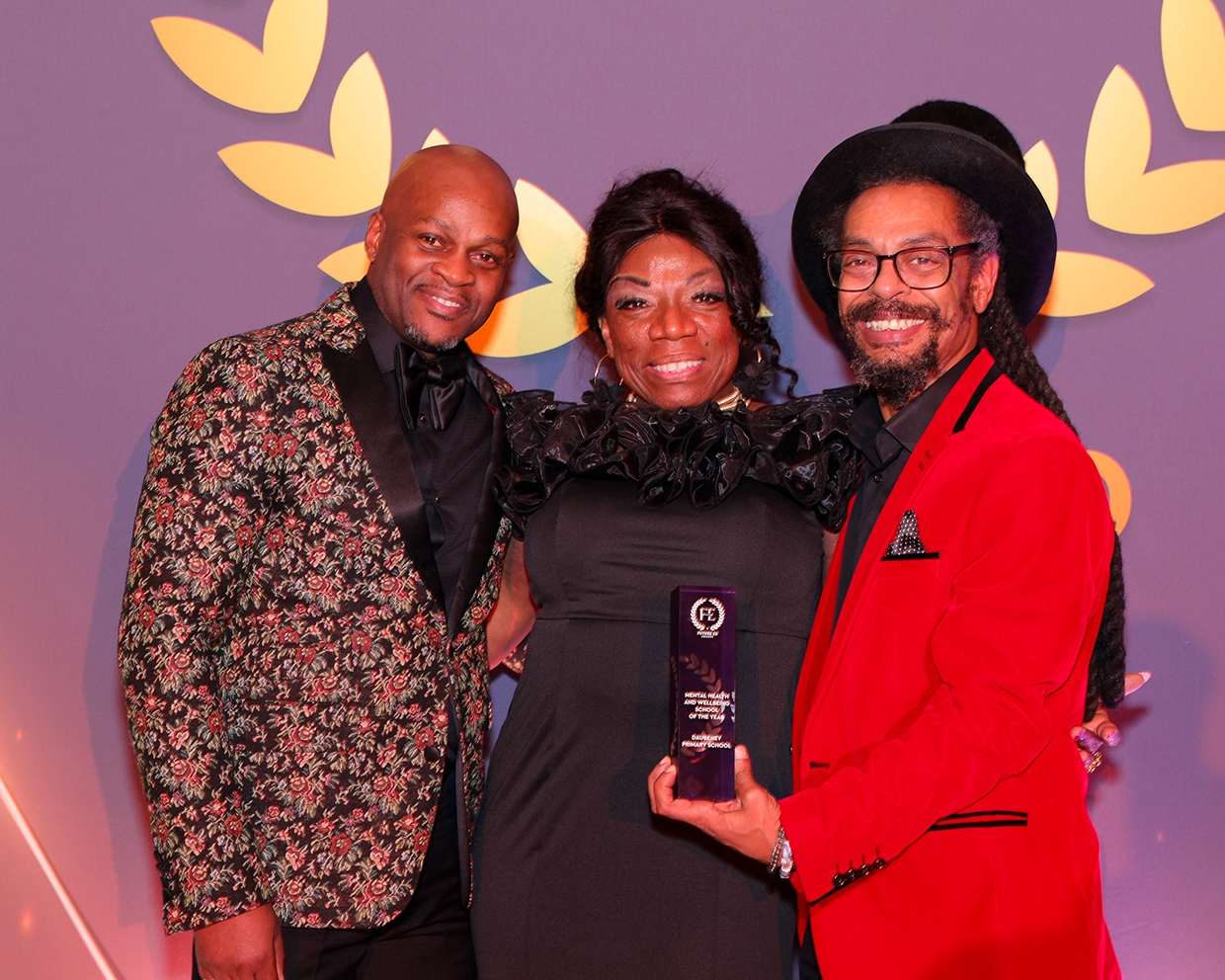 Daubeney Primary School parent and CEO, Courtney Brown, Assistant Head Teacher Cheryll Gustave and Headteacher Gregory Logan at the awards ceremony