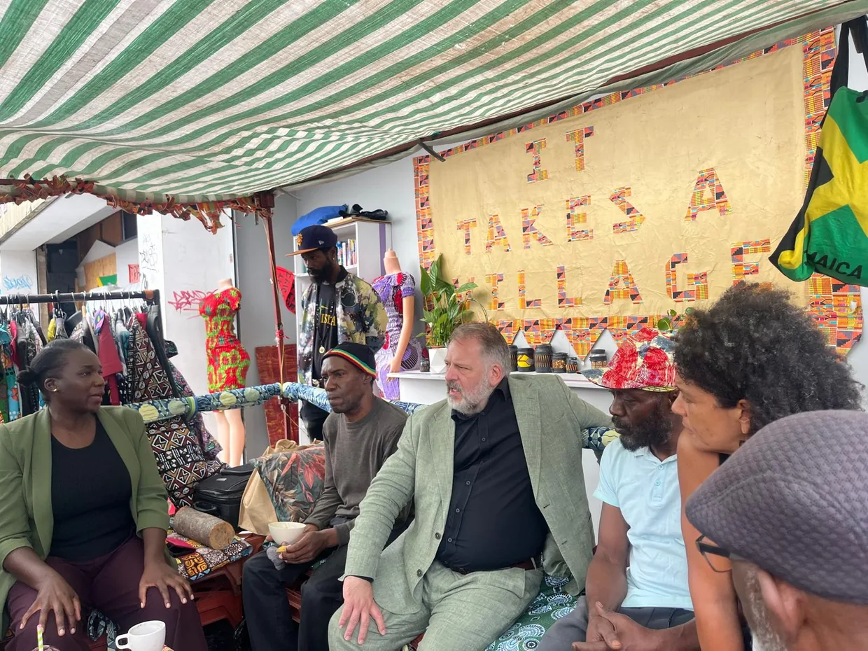 Photograph of London's deputy mayor for business Howard Dawber (centre) with traders and supporters from Save Ridley Road