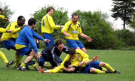 Sporting Hackney 3213 001 The goalscorer is mobbed by his team mates Photo: © Mel Roberts
