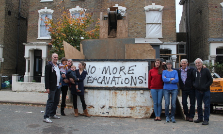 Enough: Residents of Wilberforce Road outside an excavation at number 90. Photograph: Ella Jessel