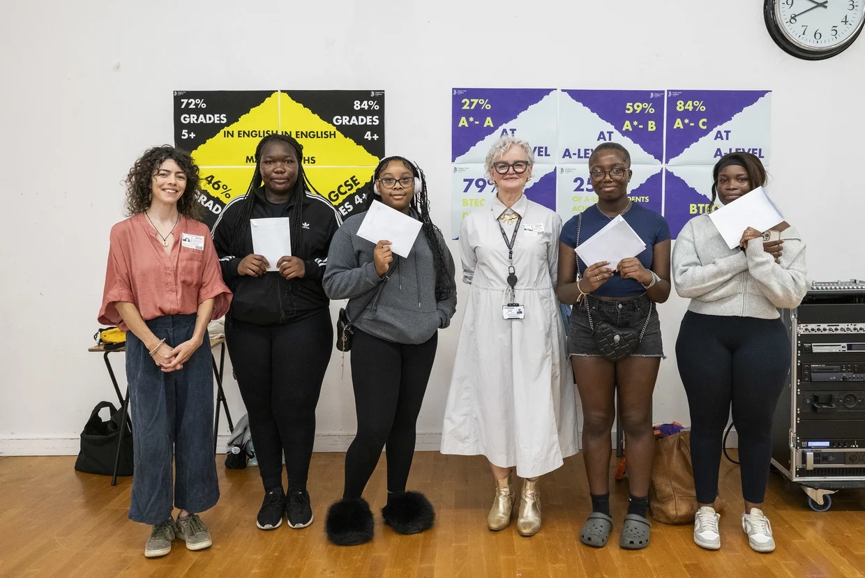 Photograph of Year 11 students from Clapton Girls Academy with Jacqui Burke, the council's group director for children and education