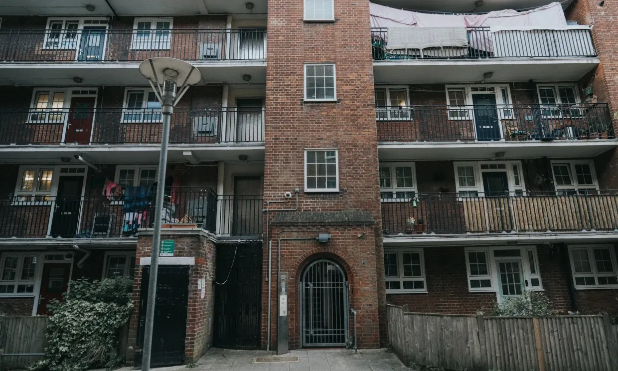 Exterior of the bricked, high rise flats in Andover Estate