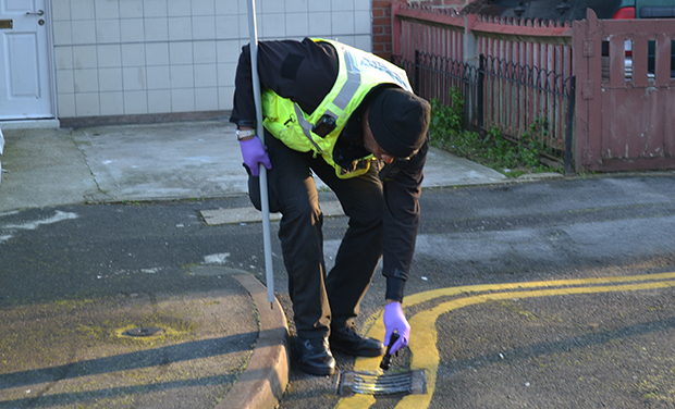 Community safety warden on weapons sweep