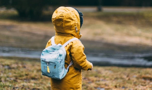 Toddler with backpack