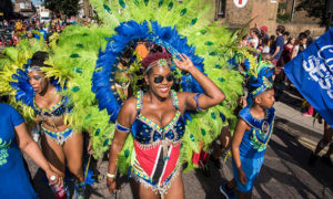 Peacock feathers featured in the colourful costumes. Photograph: Sean Pollock