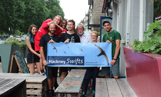 Hamish Burnett (far-right) and supporters gathered outside e Star by Hackney Downs pub - which has swift boxes in situ. Photograph: Andrew Barnes