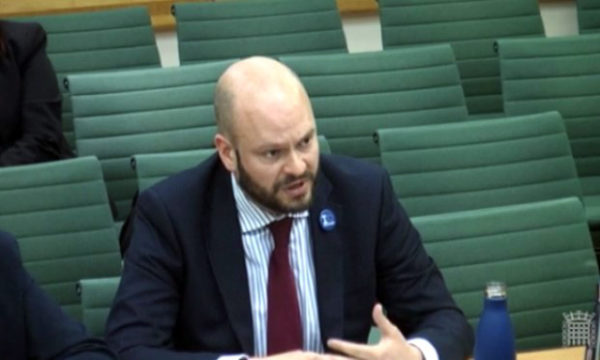 Mayor Glanville, with a reuseable water bottle, speaks at the waste inquiry. Photograph: Parliament.uk