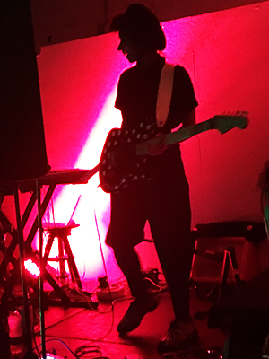 All smiles: Nabihah Iqbal's silhouette looks pleased with how her debut gig is going. Photograph: Emma Snaith