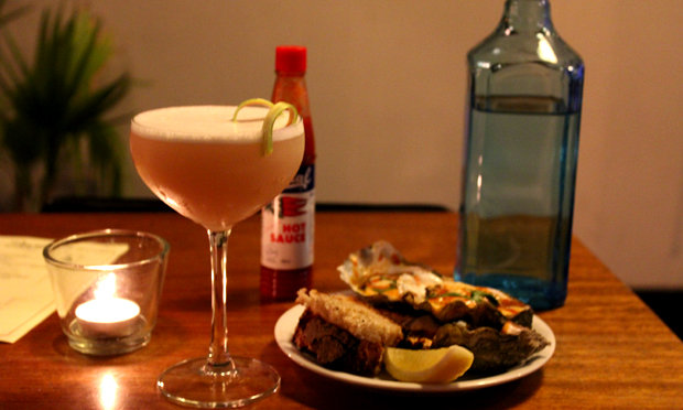 Decatur's Chargrilled Oysters with Pamela's Rhu-Barb Wire cocktail.