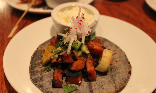Yellow bean leek taco with fermented yellow bean leeks, haloumi, sweet potato and mustard relish. Photograph: Jade King