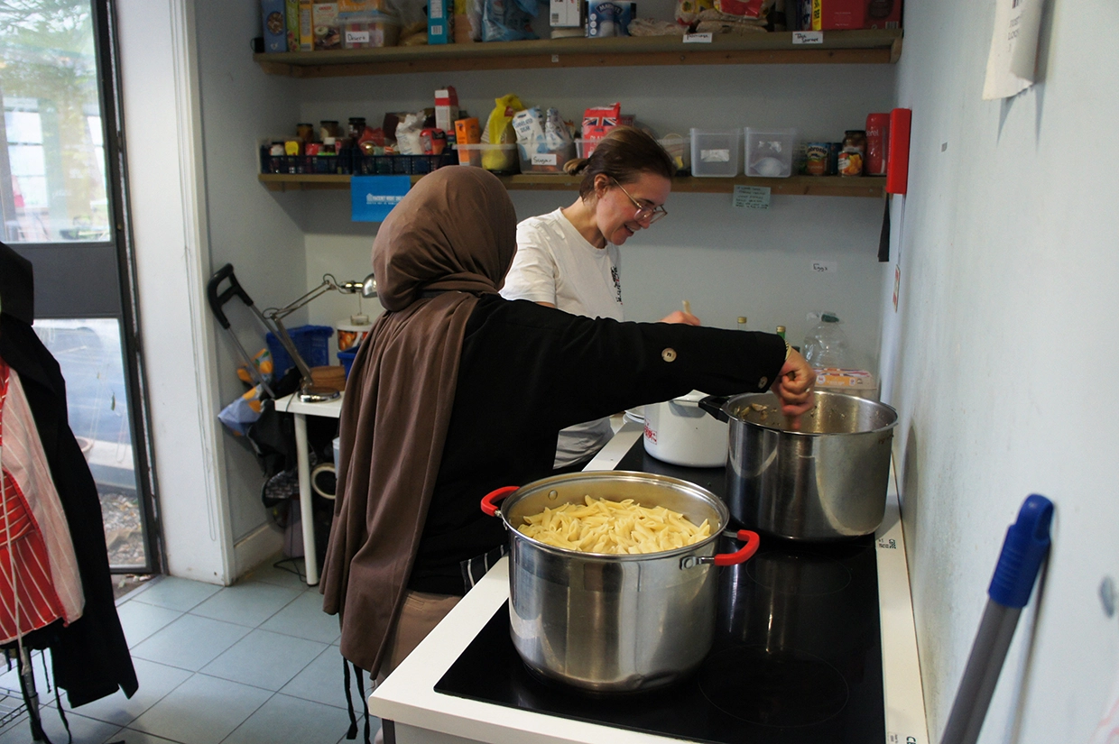 Volunteers cooking at Hackney Night Shelter